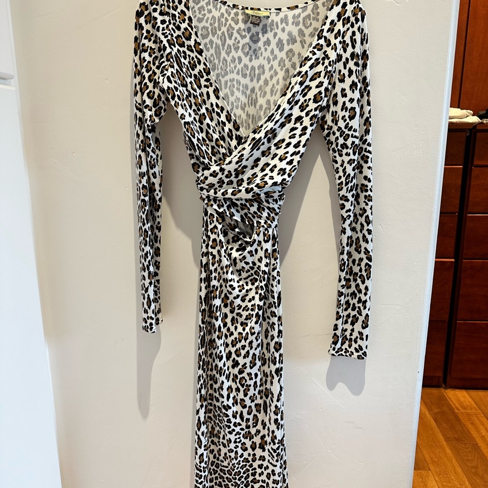 Dress like a Royal in this Issa leopard print wrap dress!